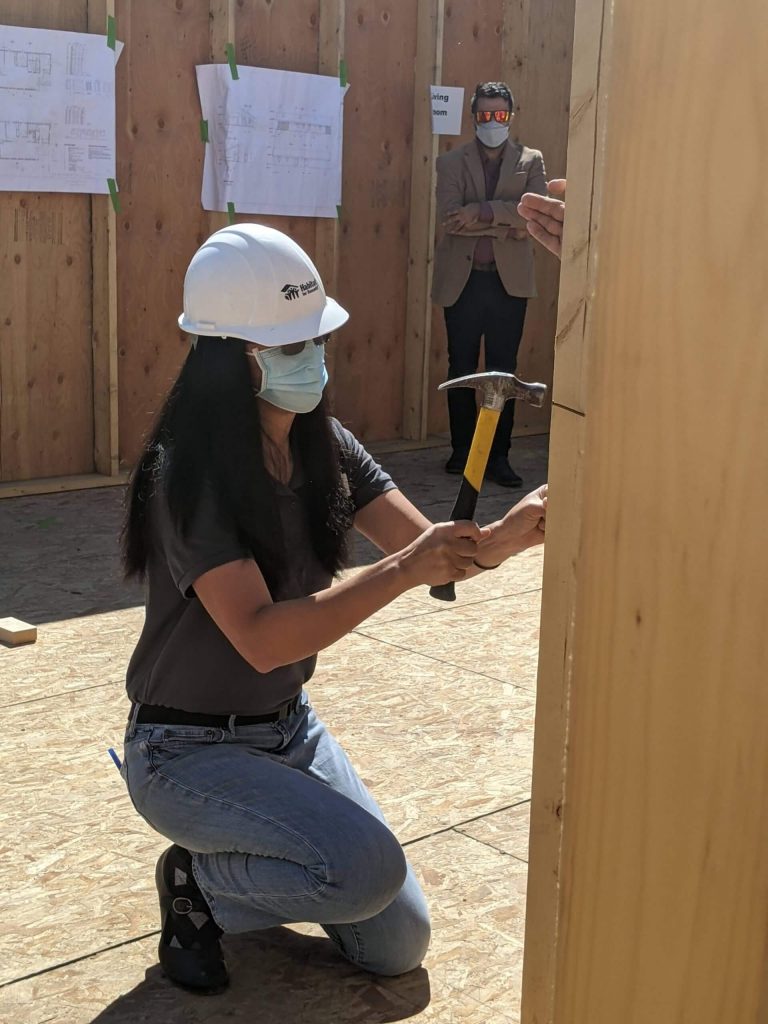Board President, Cathy Blood, at the Hansen home wall raising event.