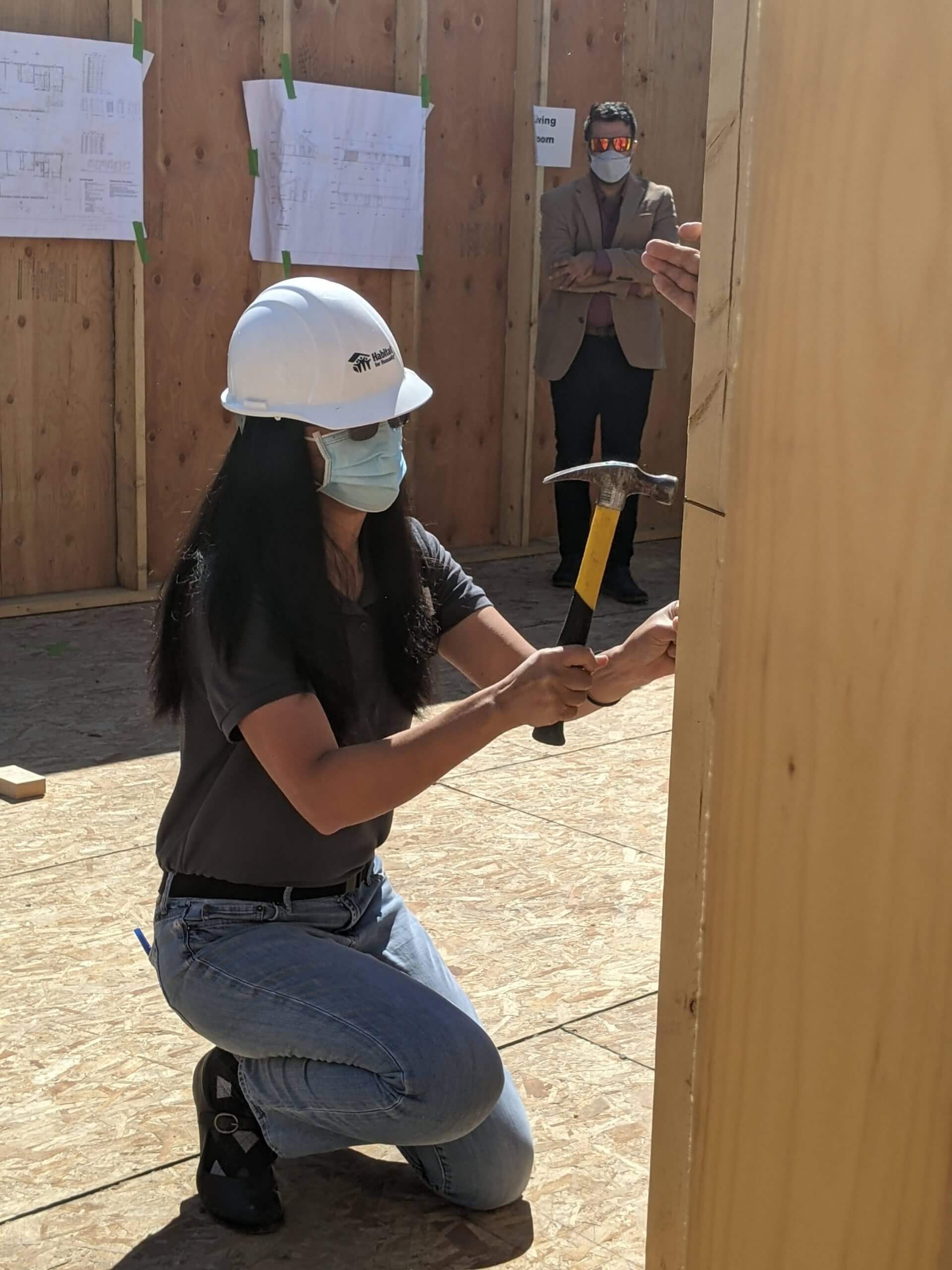 Board President, Cathy Blood, at the Hansen home wall raising event.