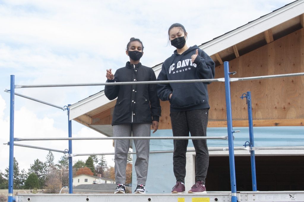Key Club Volunteers Ready to Install Soffit at the Build Site