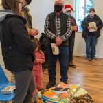 The Leaseburg Family greets volunteers at the Leaseburg Home Dedication Event.