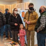 The Leaseburg Family greets volunteers at the Leaseburg Home Dedication Event.