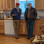 Two PHFH volunteers enjoy refreshments at the Leaseburg Home Dedication Event.