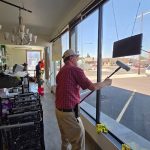 A member of the 226 Men working on the windows in the building materials section of the ReStore