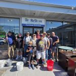Group photo of the 226 Men ready to volunteer at the ReStore