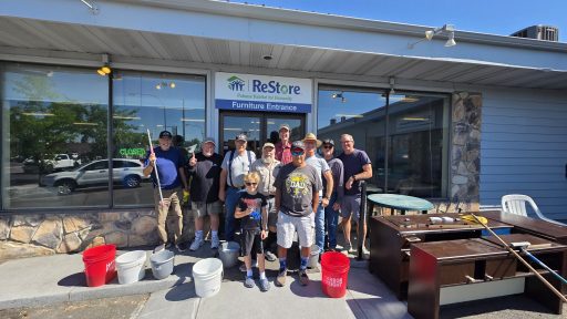 Group photo of the 226 Men ready to volunteer at the ReStore