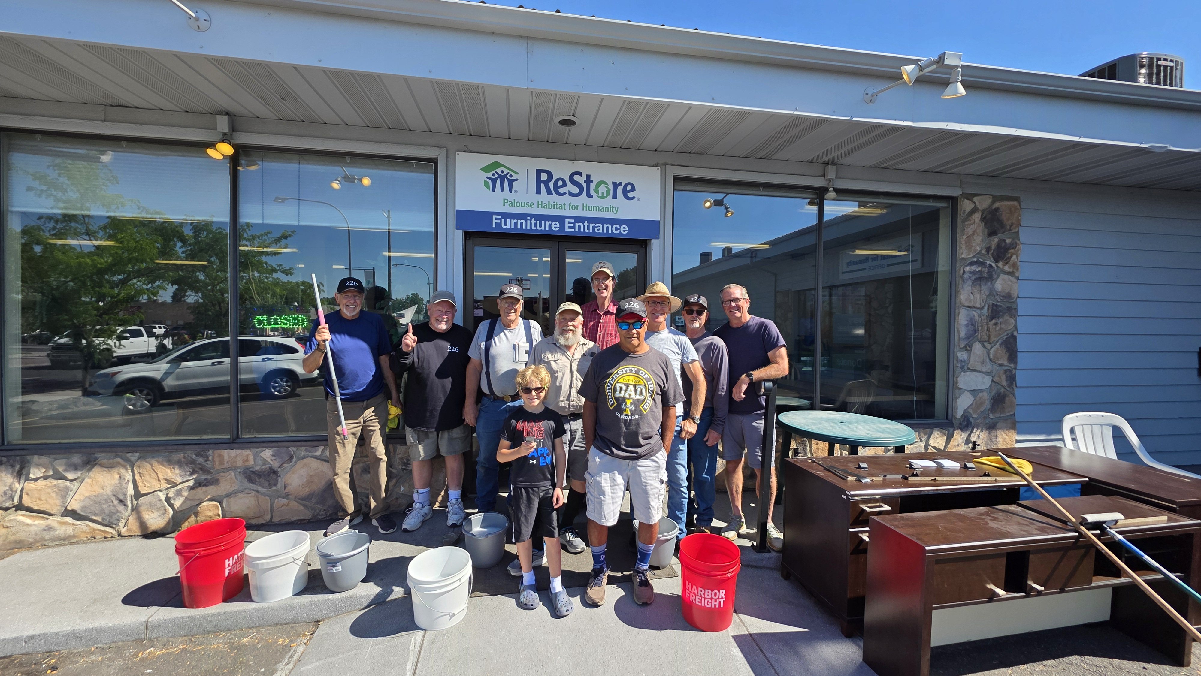 Group photo of the 226 Men ready to volunteer at the ReStore